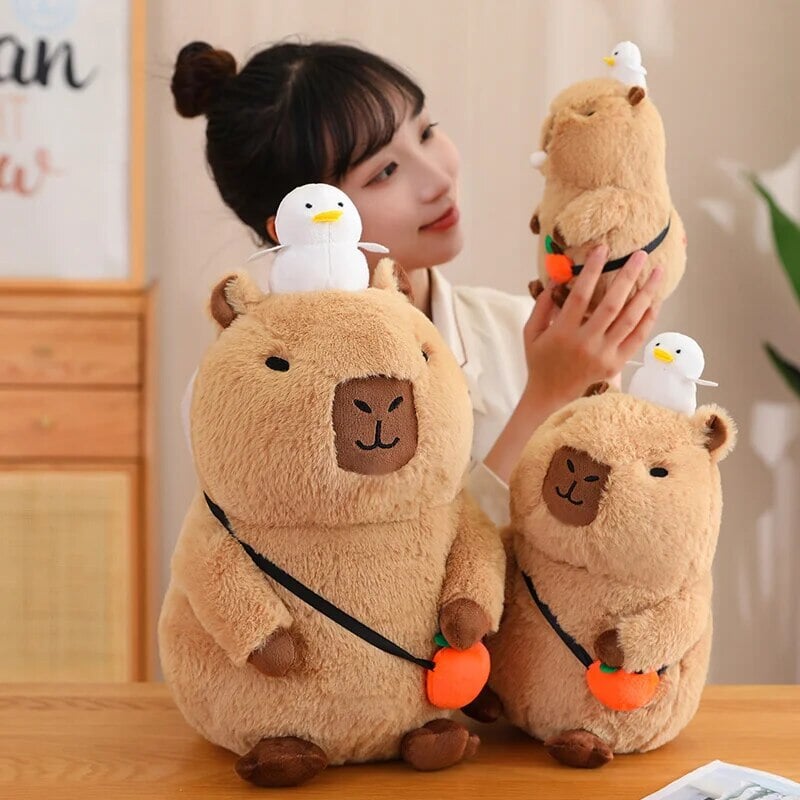 Fluffy Sleepy Capybara with Orange Plushie