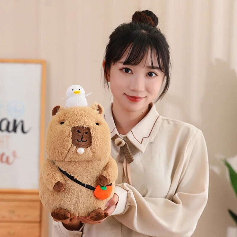 Fluffy Sleepy Capybara with Orange Plushie