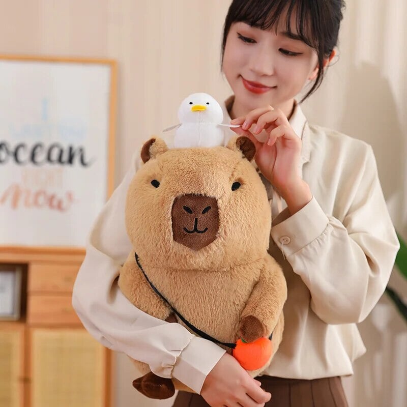 Fluffy Sleepy Capybara with Orange Plushie