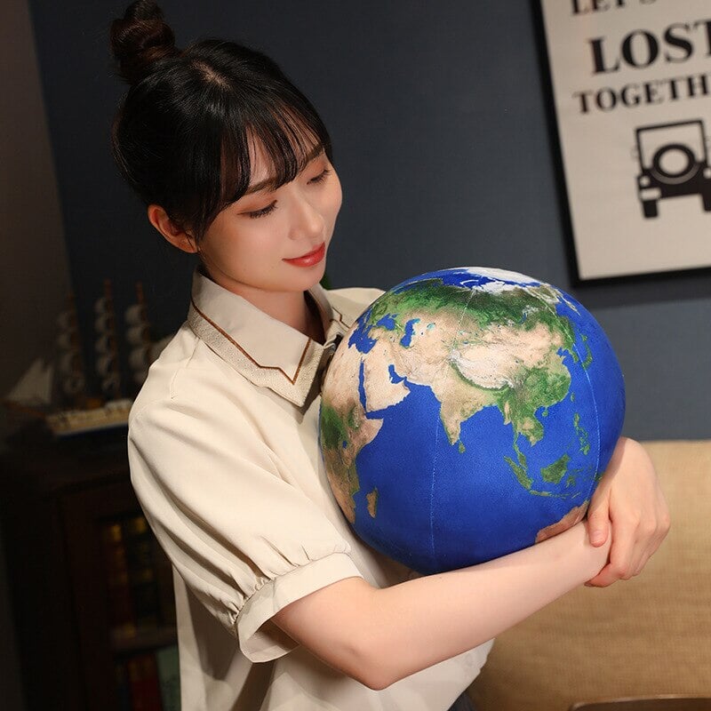 Cuddle Up with a Planet Plushie!