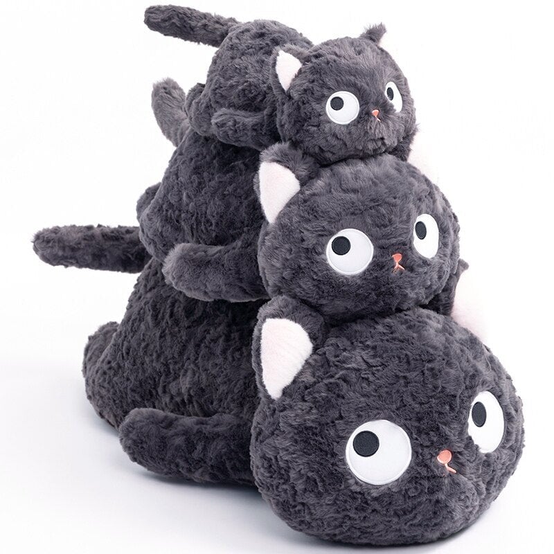 Jiji the Fluffy Black Cat Plushie Laying Down