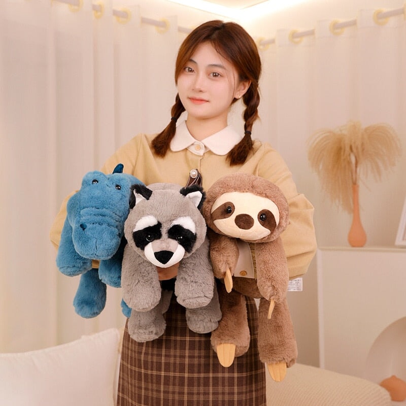 Laying Sloth and Fox Raccoon Crocodile Plushie Friends