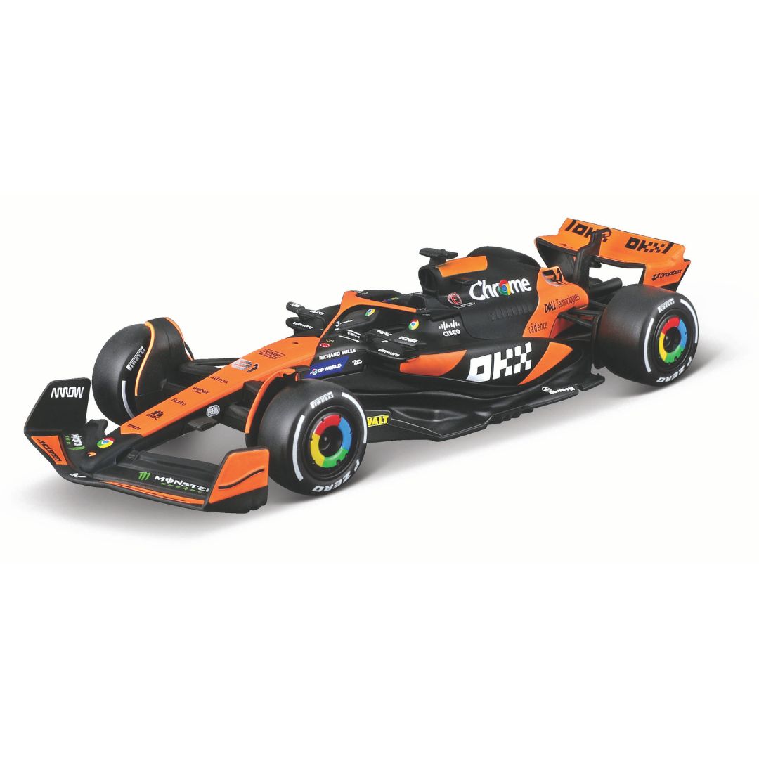 18-38215 Bburago - Équipe McLaren F1 MCL38 #81 (Piastri), avec casque -1:43