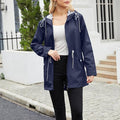 Women’s Hooded Windbreaker Rain Jacket with Zip Pockets