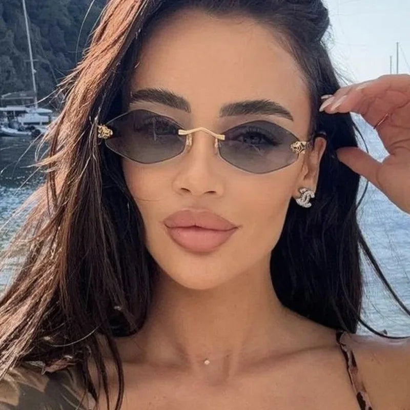 Women’s Rimless Geometric Oval Frame Sunglasses